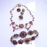 A similar suite of garnet set jewellery, to include a necklace, bracelet and 2 pairs of earrings
