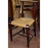 An Antique rush-seated chapel chair with stamp of St. Paul's Cathedral