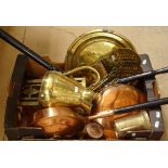 A collection of various copper and brass items, including bed warming pans, chargers and jug etc