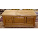 A rectangular oak centre standing coffee table, with sliding top, and drawer fitted base, W120cm