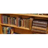 Various leather-bound books, including Dickens, J B Priestley etc