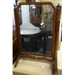 A small Antique mahogany-framed swing toilet mirror