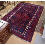 A blue ground wool Caucasian rug, 250cm x 165cm