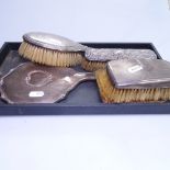 4 silver-backed dressing table brushes, and a silver-backed dressing table mirror (5)