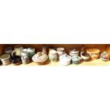 A shelf of Studio pottery vases, pots and covers etc