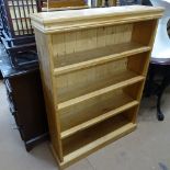 A pine 4-tier open bookcase, W82cm