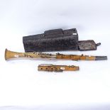 A Butler of Haymarket clarinet, with Dawe & Son rosewood mouthpiece, and black painted tin