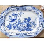 A Victorian Stone China meat dish with blue and white printed chinoiserie bird and floral design,