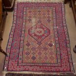 An Antique red ground Persian rug, with symmetrical pattern, 143cm x 103cm, and a small Antique blue