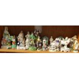 A shelf of various 19th century and other figures, including Derby and Staffordshire (A/F)
