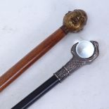 A brass Buddha head hardwood walking cane, and a modern crystal ball knop sword stick (lacking