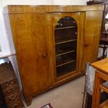 A large Art Deco German walnut 3-door armoire, with fitted adjustable shelves, W212cm, D44cm, H187cm