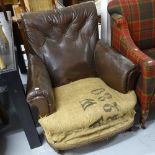 A Vintage brown leather upholstered Club chair