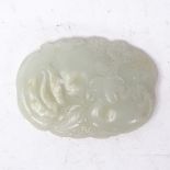 A Chinese carved jade buckle, floral and leaf decoration, length 8cm