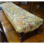 A 19th century mahogany and needlework upholstered fender stool, on short carved legs