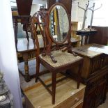 An Edwardian mahogany oval swing toilet mirror, with satinwood and ebony banding