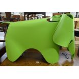An Eames style elephant stool in green plastic (no marker's marks)