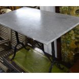 A rectangular marble-top garden table on cast-iron base, W100cm, H72cm, D62cm