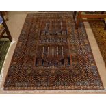 A brown ground Persian design rug, with symmetrical lozenge and border, 184cm x 125cm