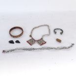 A cylinder seal, Roman bronze torque bangle, Neolithic arrowheads, Zulu beadwork necklaces