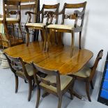 A Regency design mahogany dining room suite, comprising a D-end dining table with single spare leaf,