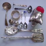 A box of mixed plated cutlery, a pewter pig design pin cushion etc