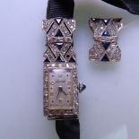 ACCURIST - a lady's Art Deco platinum cocktail wristwatch, set with diamonds and triangular cut