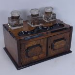 A Victorian walnut table-top writing cabinet, with 3 large fitted cut-glass inkwells, pen tray and