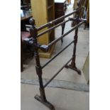 An Edwardian mahogany towel rail