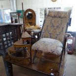 A Victorian mahogany framed folding armchair and an Arts and Crafts occasional table, (2)
