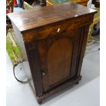 A Regency rosewood side cabinet, with single panelled door, on bun feet, W64cm