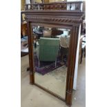 A 19th century walnut rectangular bevelled-edge wall mirror, with double fluted columns, W102cm