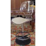 A modernist design metal and perspex swivel chair