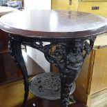 A circular pub table on embossed cast-iron base, W60cm, WITH THE OPTION TO PURCHASE THE NEXT LOT