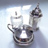 A silver mustard pot with Bristol blue liner, a tapered silver pepper pot, and a cut-glass and