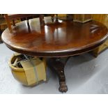 A William IV mahogany circular-top breakfast table, on turned centre column and trifor base, with