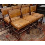 A set of 6 1920s studded leather-upholstered and oak turned dining chairs