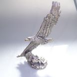 A Comyns Studio Collection sterling silver-clad bald eagle in flight, with impressed marks, height