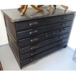 A Vintage black painted 2-section 6-drawer Plan chest