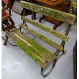 A Victorian scrolled wrought-iron garden bench with slatted seat, W100cm