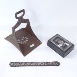 A Middle Eastern engraved iron stirrup, and 2 Middle Eastern oxidised metal items (3)