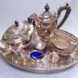 An Elkington plate 4-piece tea and coffee set of half-fluted form, a 3-piece cruet, and an oval