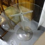 A circular glass-top side table on chrome base, W76cm, H72cm