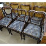 A set of 6 William IV rosewood dining chairs, with leather-upholstered seats, and tapered legs