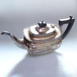 A George V silver teapot, hallmarks for Birmingham 1918, maker's marks for Martin Hall & Co Ltd,