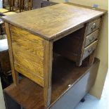 A small 1920s oak writing desk with 3 short drawers, W83cm