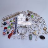 A collection of silver costume jewellery, glass pendants and other costume jewellery