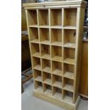 A modern pine set of pigeon holes, W55cm