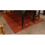A red ground wool Persian Gabbeh rug, 245cm x 155cm