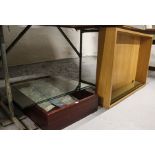 A light oak rectangular hanging display cabinet with glass shelves, 92cm x 65cm, and rectangular